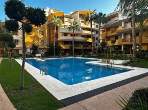 Ground floor Punta Prima apartment looking at the pool